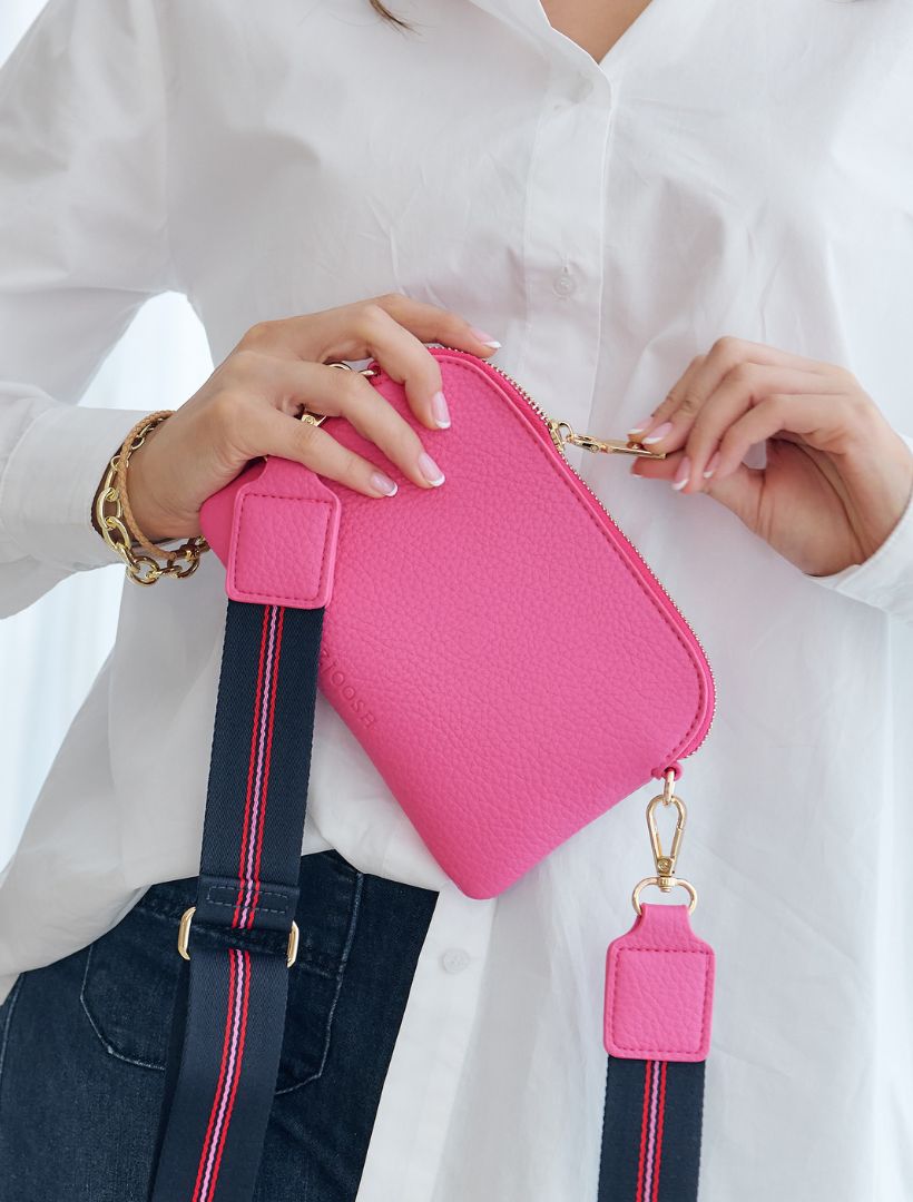 Front view - bright pink cross body bag