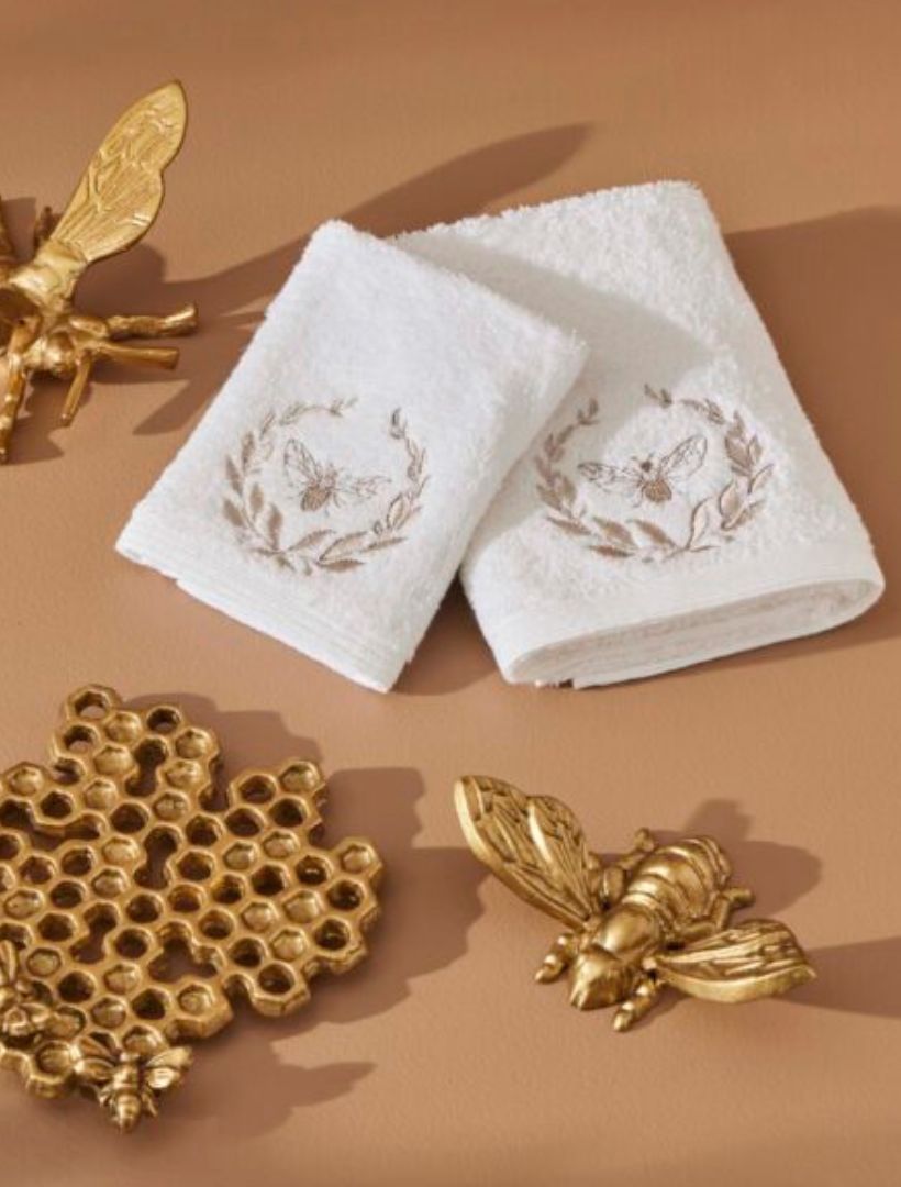 Lifestyle white bee motif hand towel