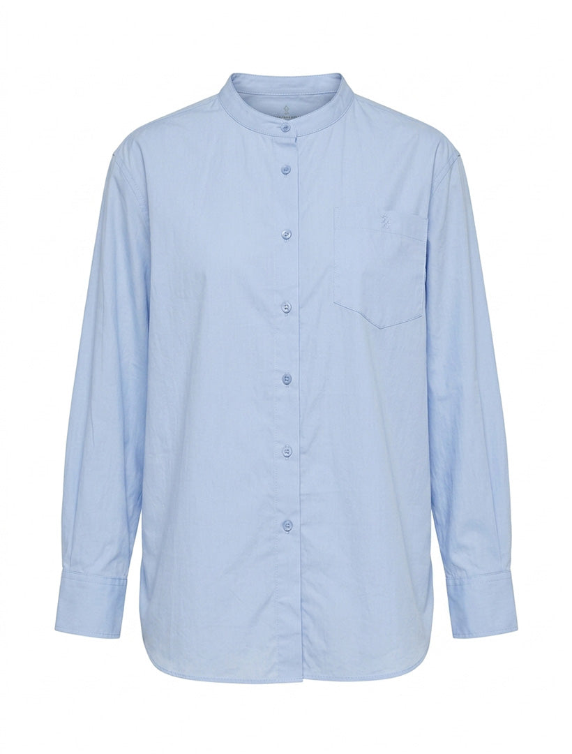 A light blue long-sleeve button-up shirt with a mandarin collar and a chest pocket, displayed on a clean white background.