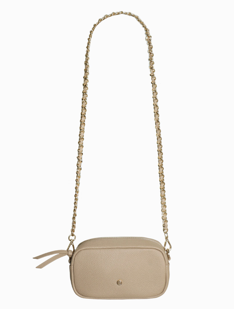 Beige cross body bag with gold chain strap