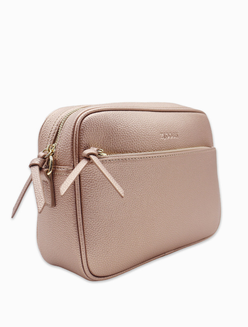 Side view - rose gold cross body bag