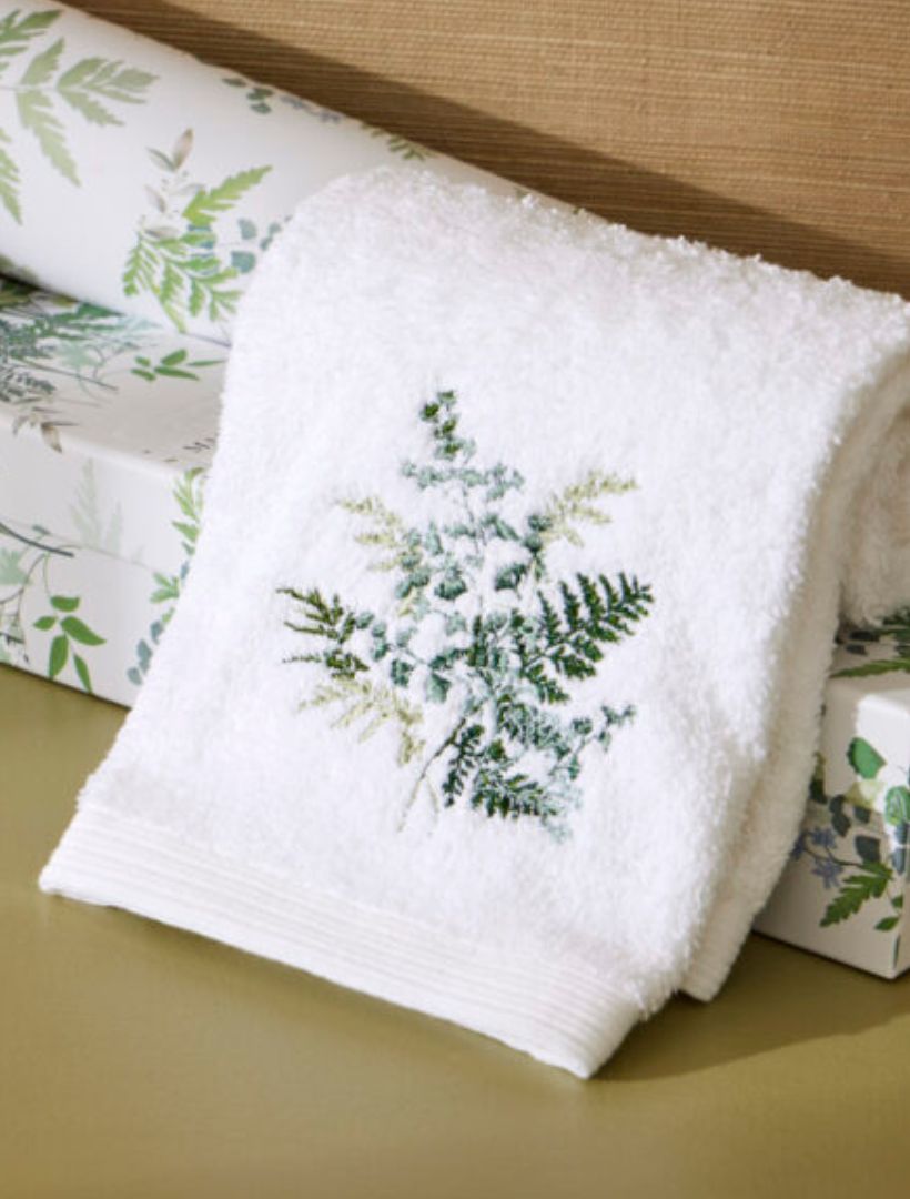 Detail - white embroidered hand towel