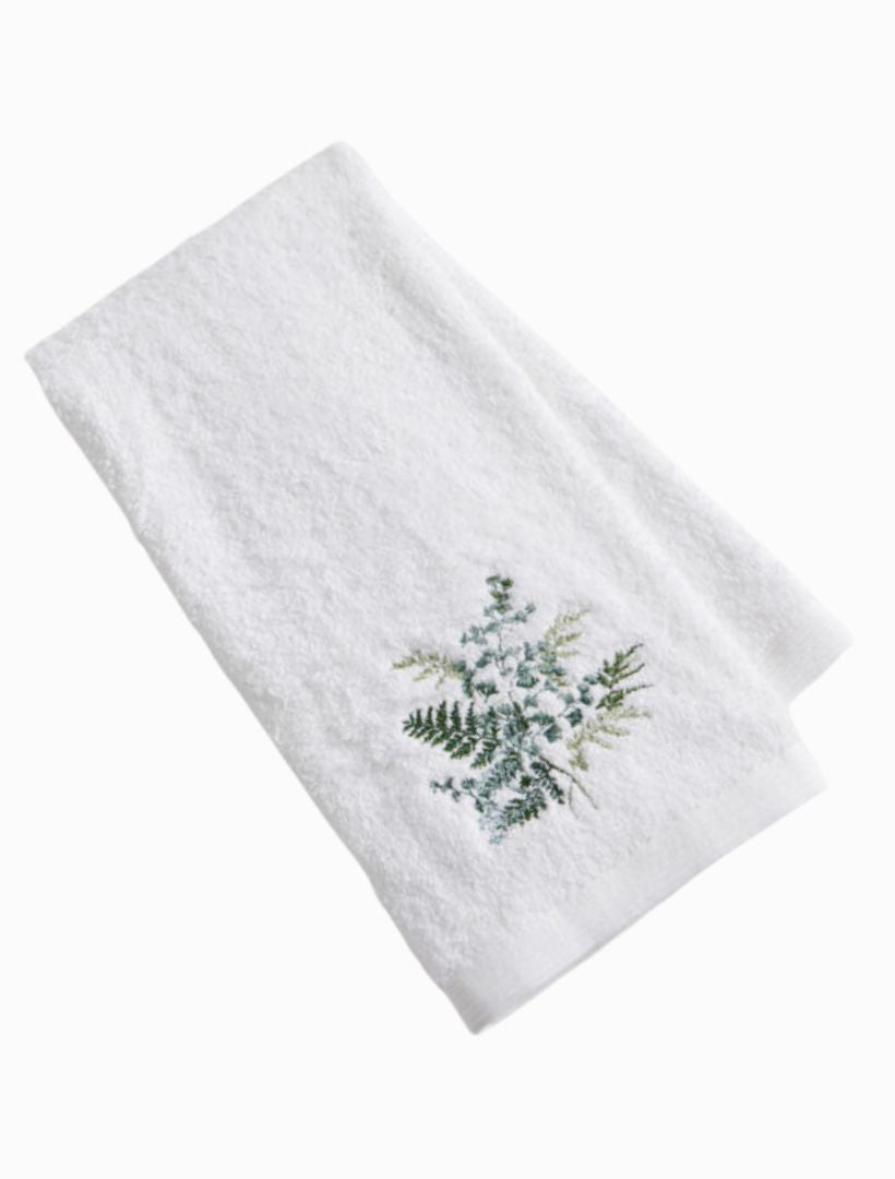 Front view - white embroidered hand towel