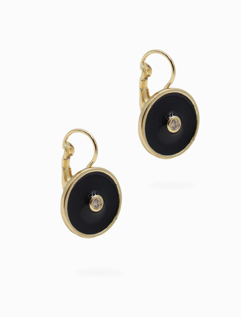 Side view - round black enamel earrings