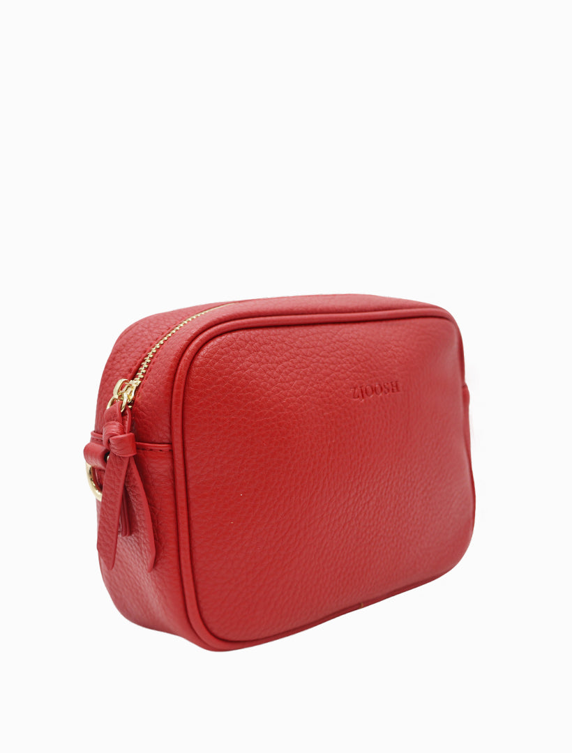 Side view - cross body red bag