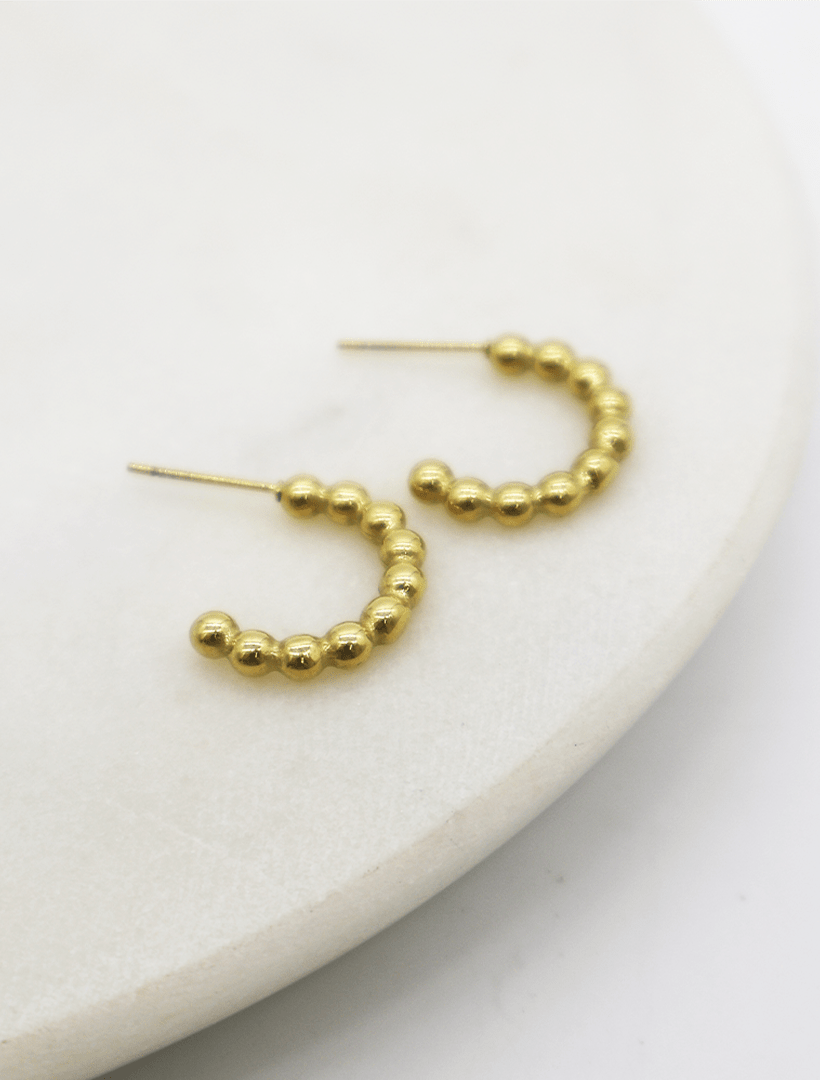 side flay lat of gold half hoop with ball detail - zjoosh