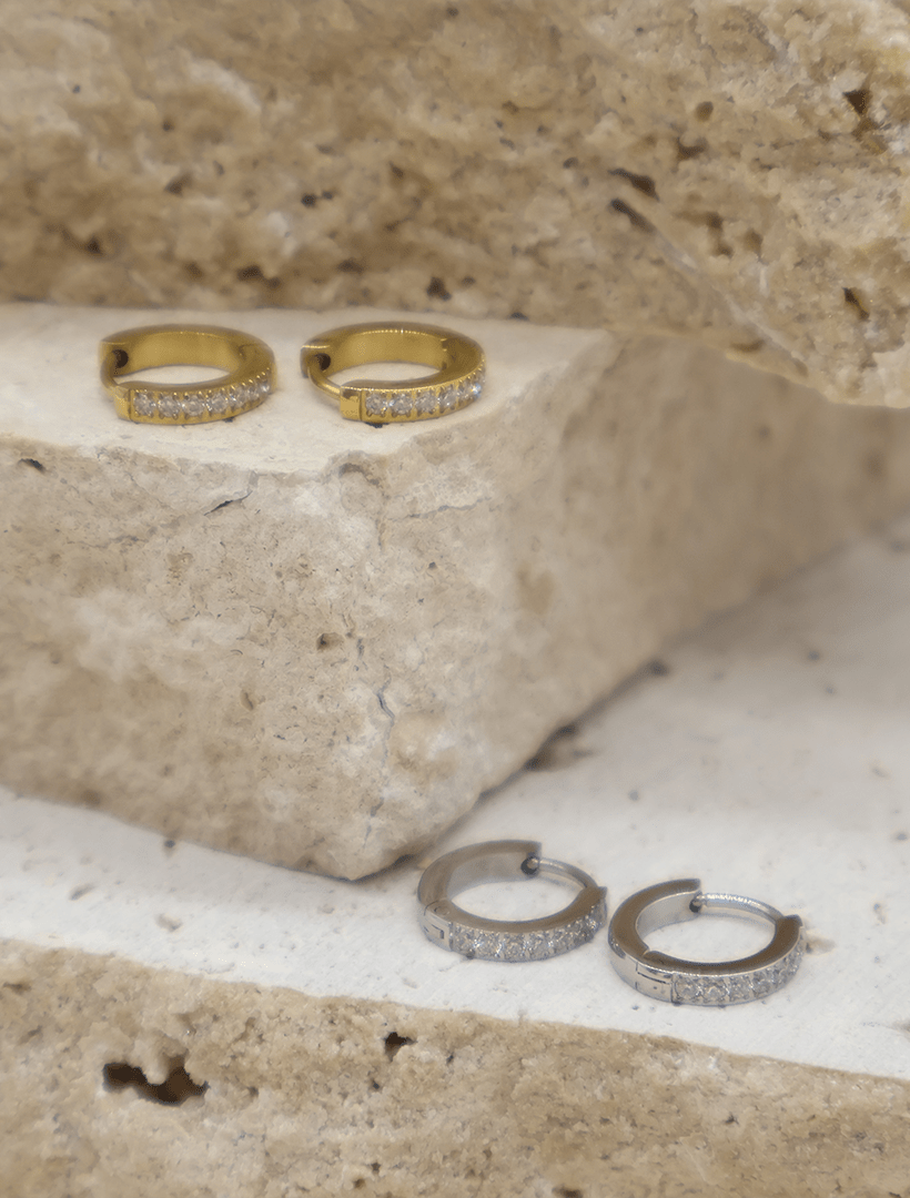 front view of small silver hoop earring with crystal detailing on front - zjoosh