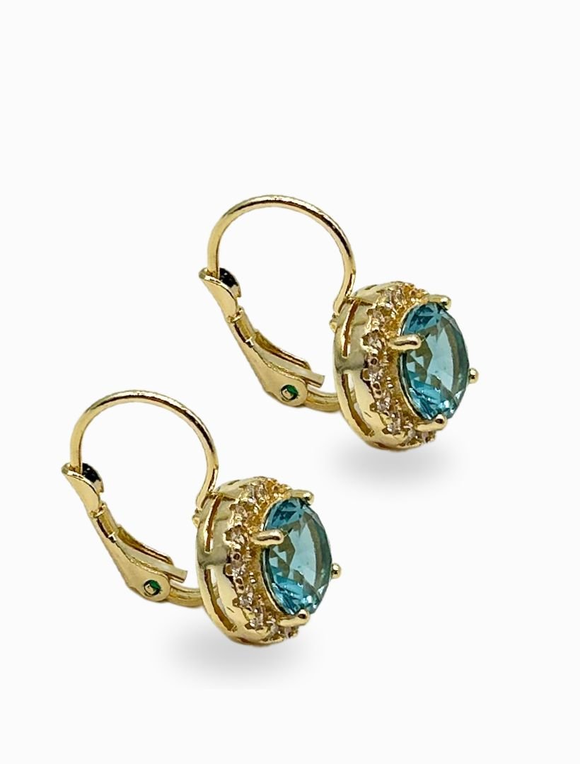 side view of gold french hook earrings with round light blue centre crystal and surrounding white crystals - zjoosh