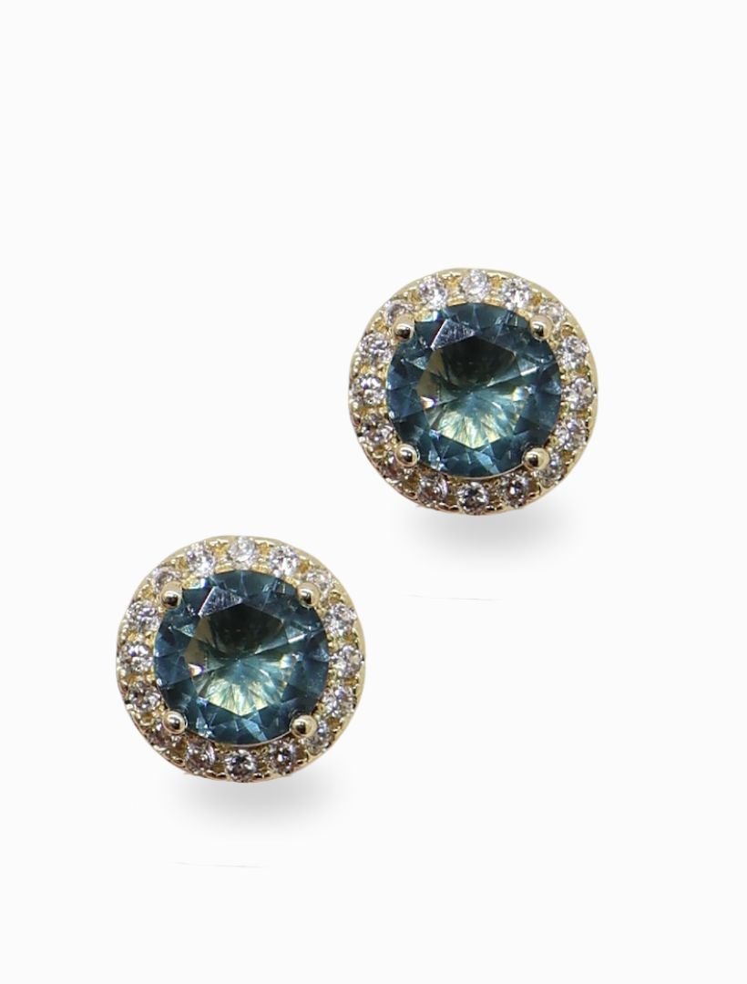 front view of gold stud earrings with light blue centre stones and crystal surrounds