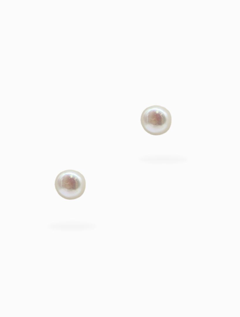 Front view - mini pearl stud earrings