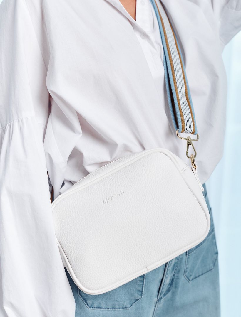 model wearing white cross body bag from zjoosh