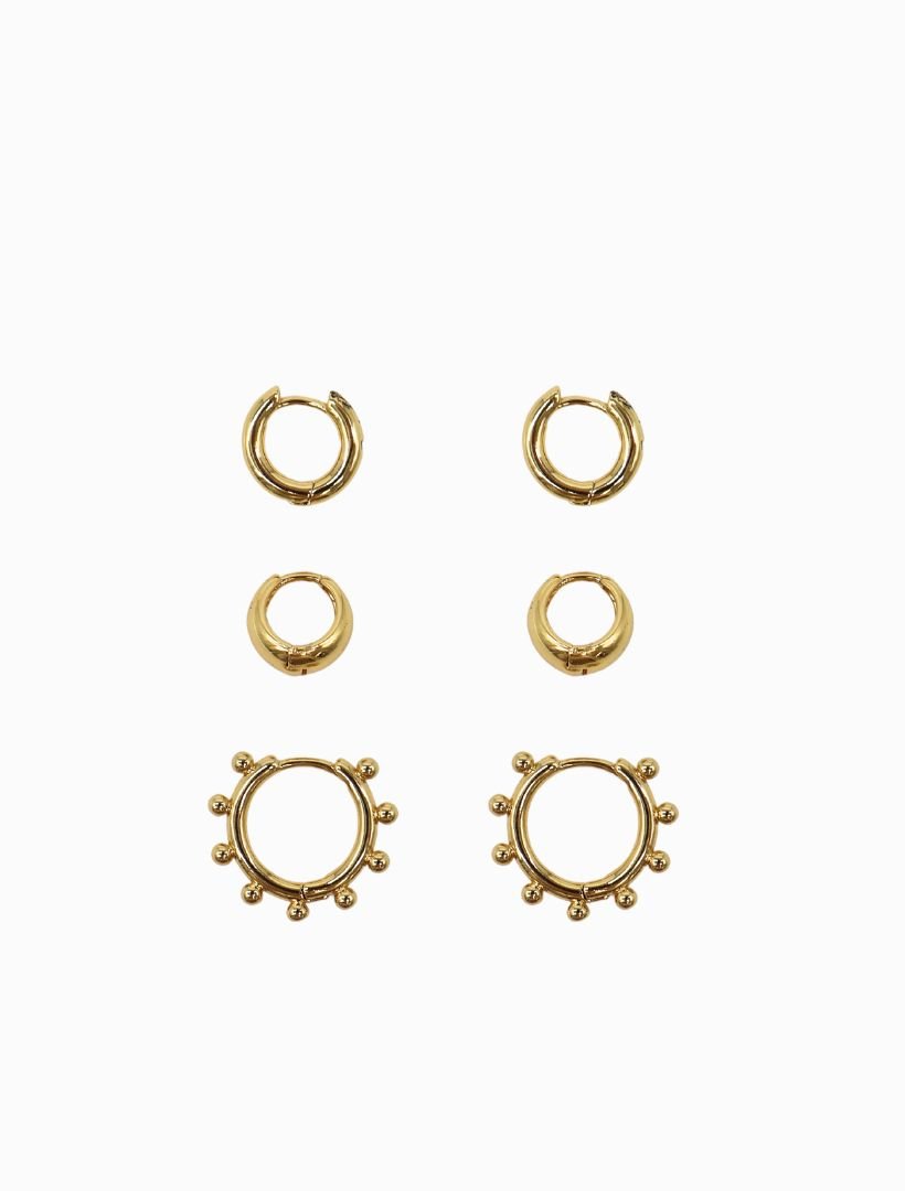 flat lay side view of three hoop earrings, small hoop, wide small hoop and hoop with bead detailing - zjoosh